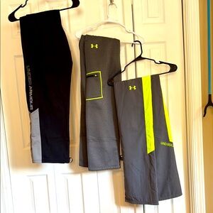 3 pair Under Armour Performance Pants Trio - Black, Gray, Neon Yellow/green. YXL